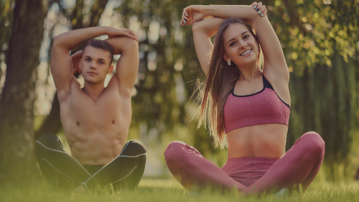 Healthy couple enjoying outdoor wellness routine for active balanced lifestyle